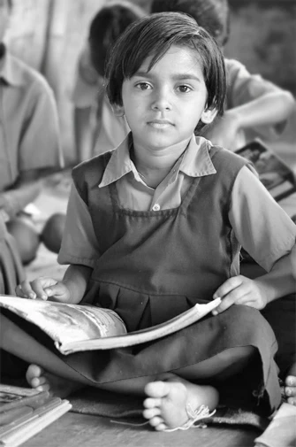 Girl child from a school supported by Care For Children